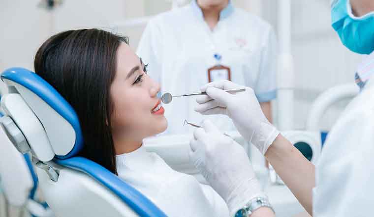 Bà bầu mọc răng khôn có ảnh hưởng tới thai nhi không